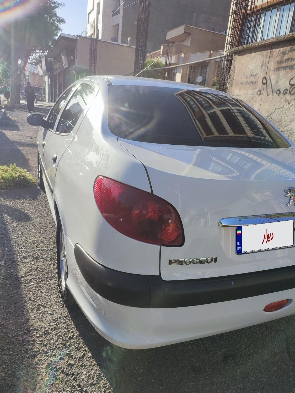 پژو ۲۰۶ صندوق دار v8 - 1397