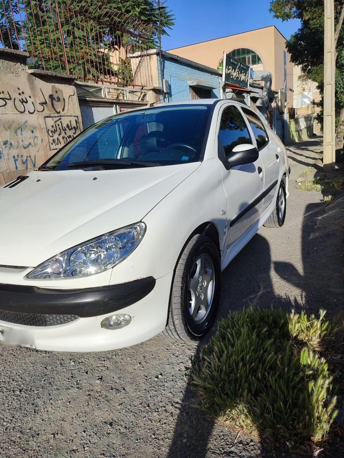 پژو ۲۰۶ صندوق دار v8 - 1397