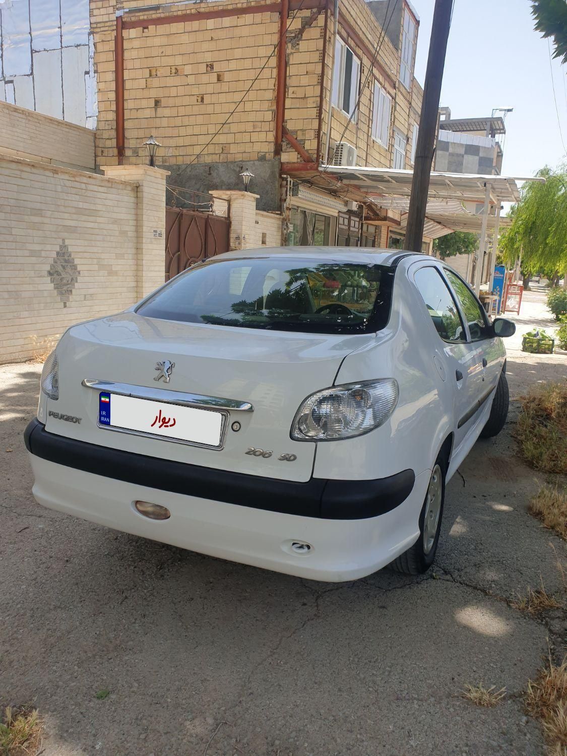 پژو ۲۰۶ صندوق دار v8 - 1390
