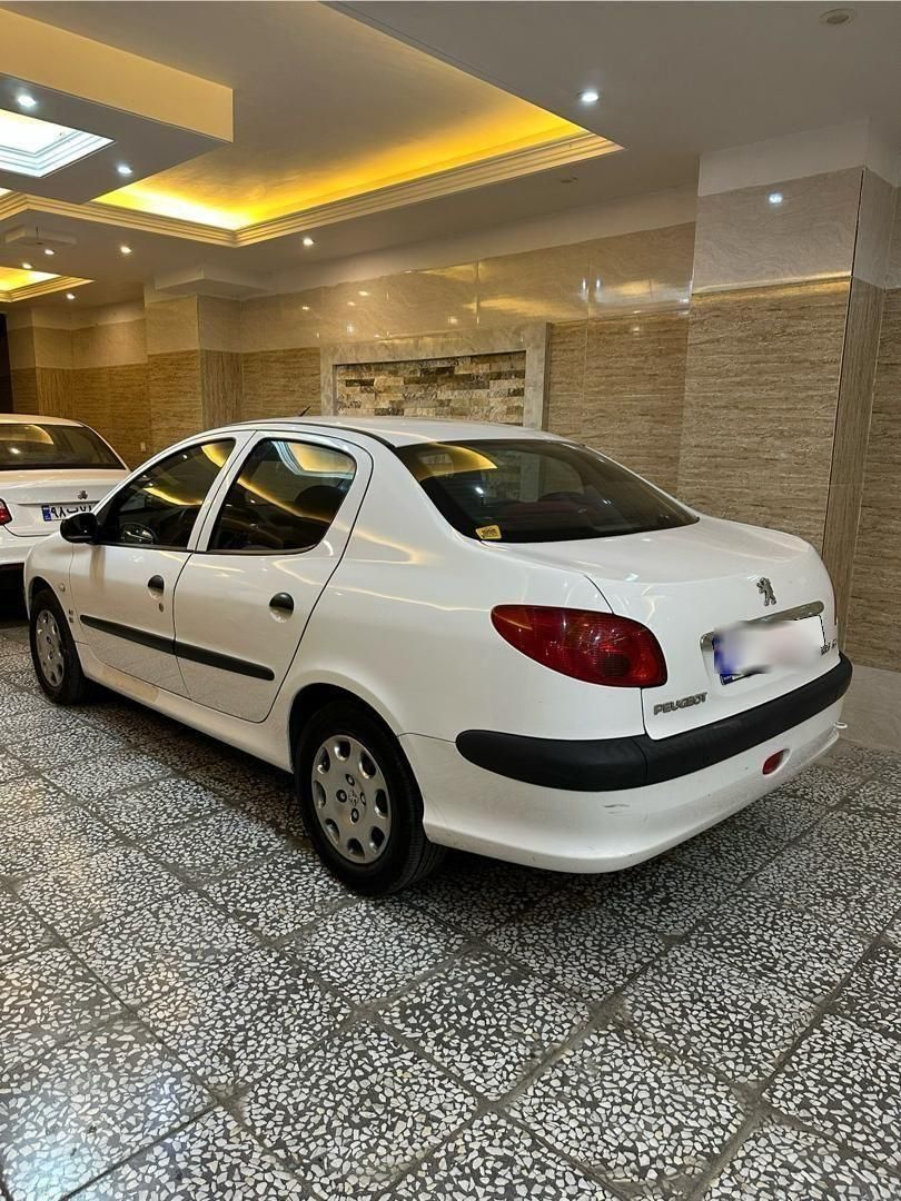 پژو ۲۰۶ صندوق دار v8 - 1396