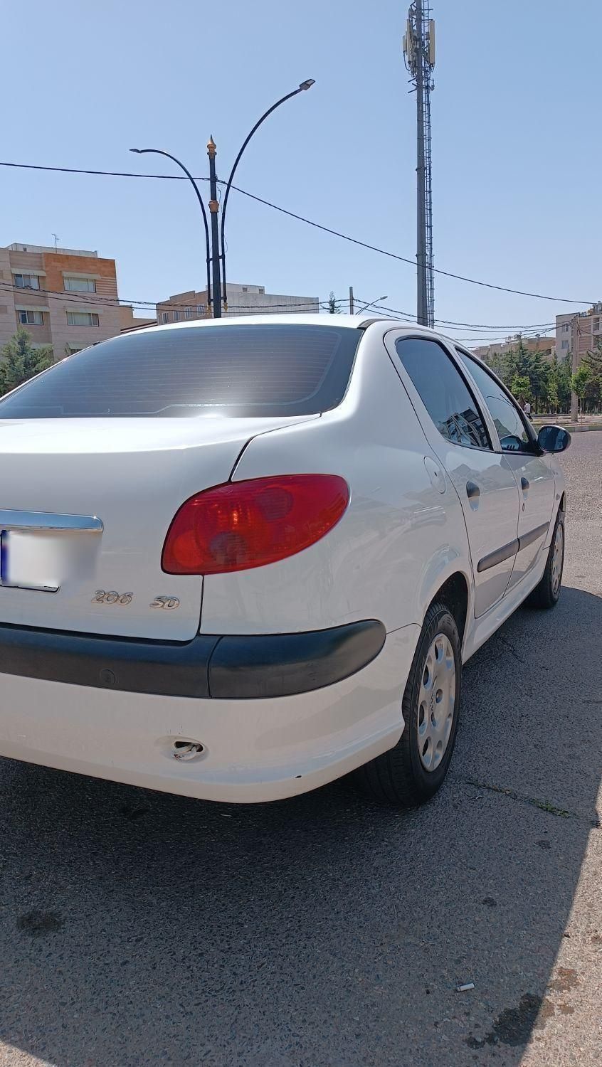 پژو ۲۰۶ صندوق دار v8 - 1396