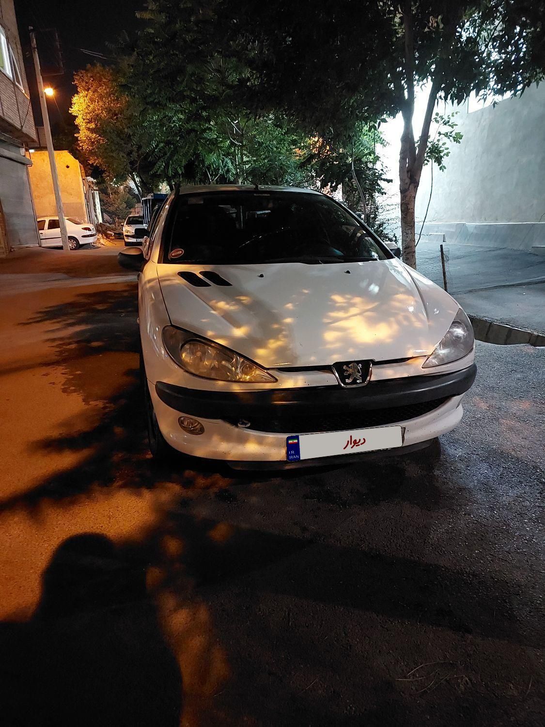 پژو ۲۰۶ صندوق دار v8 - 1391