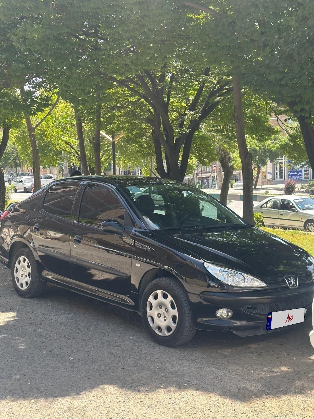 پژو ۲۰۶ صندوق دار v8 - 1397