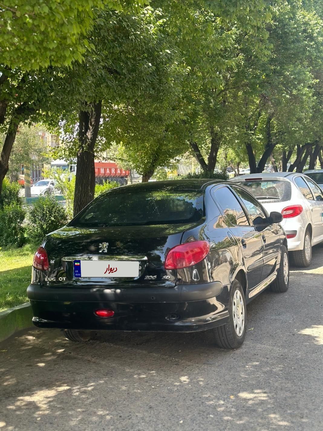 پژو ۲۰۶ صندوق دار v8 - 1397