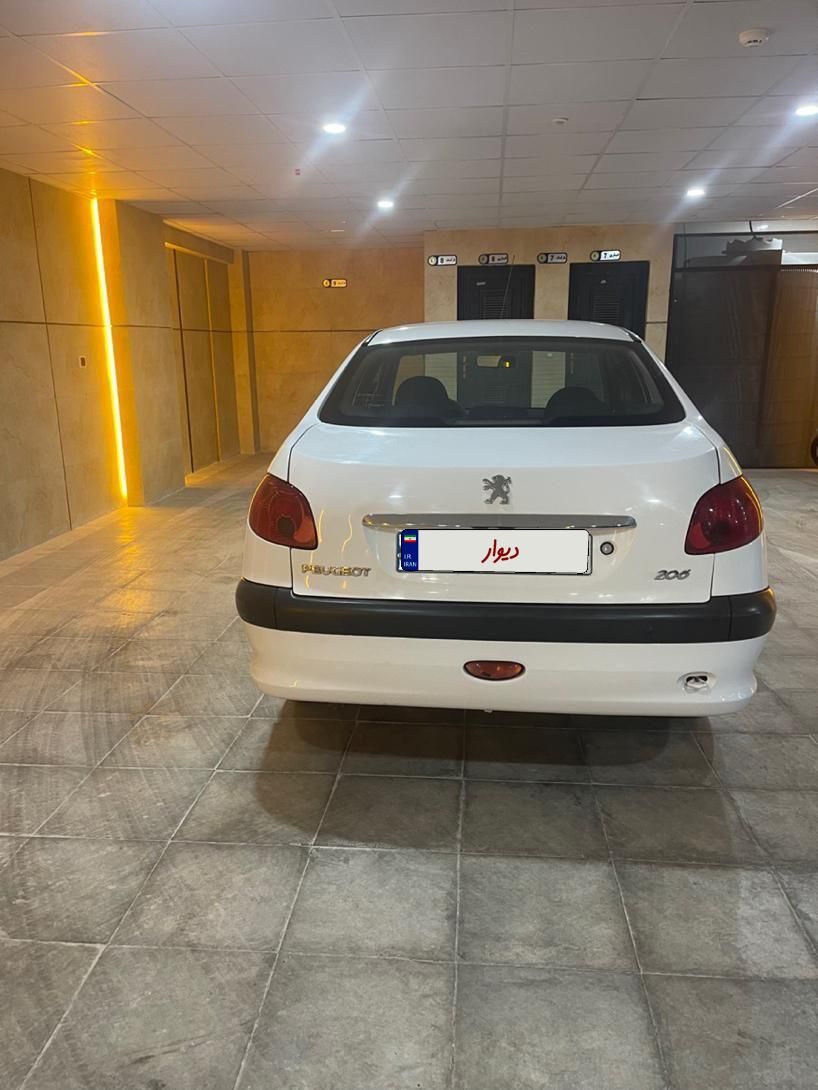 پژو ۲۰۶ صندوق دار v8 - 1395
