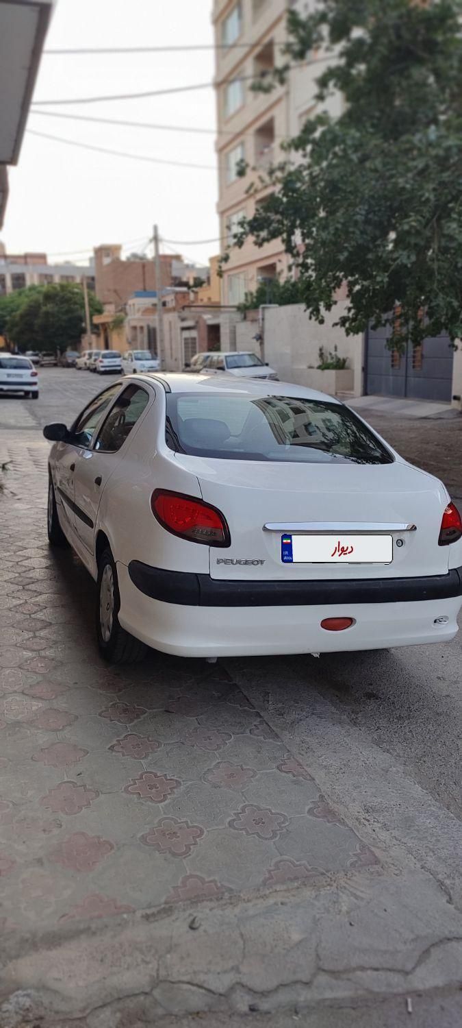 پژو ۲۰۶ صندوق دار v8 - 1395