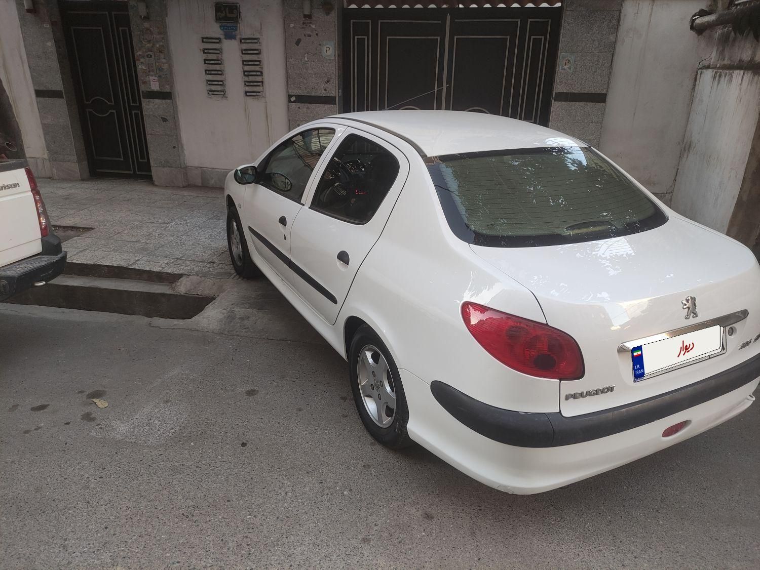 پژو ۲۰۶ صندوق دار v8 - 1390