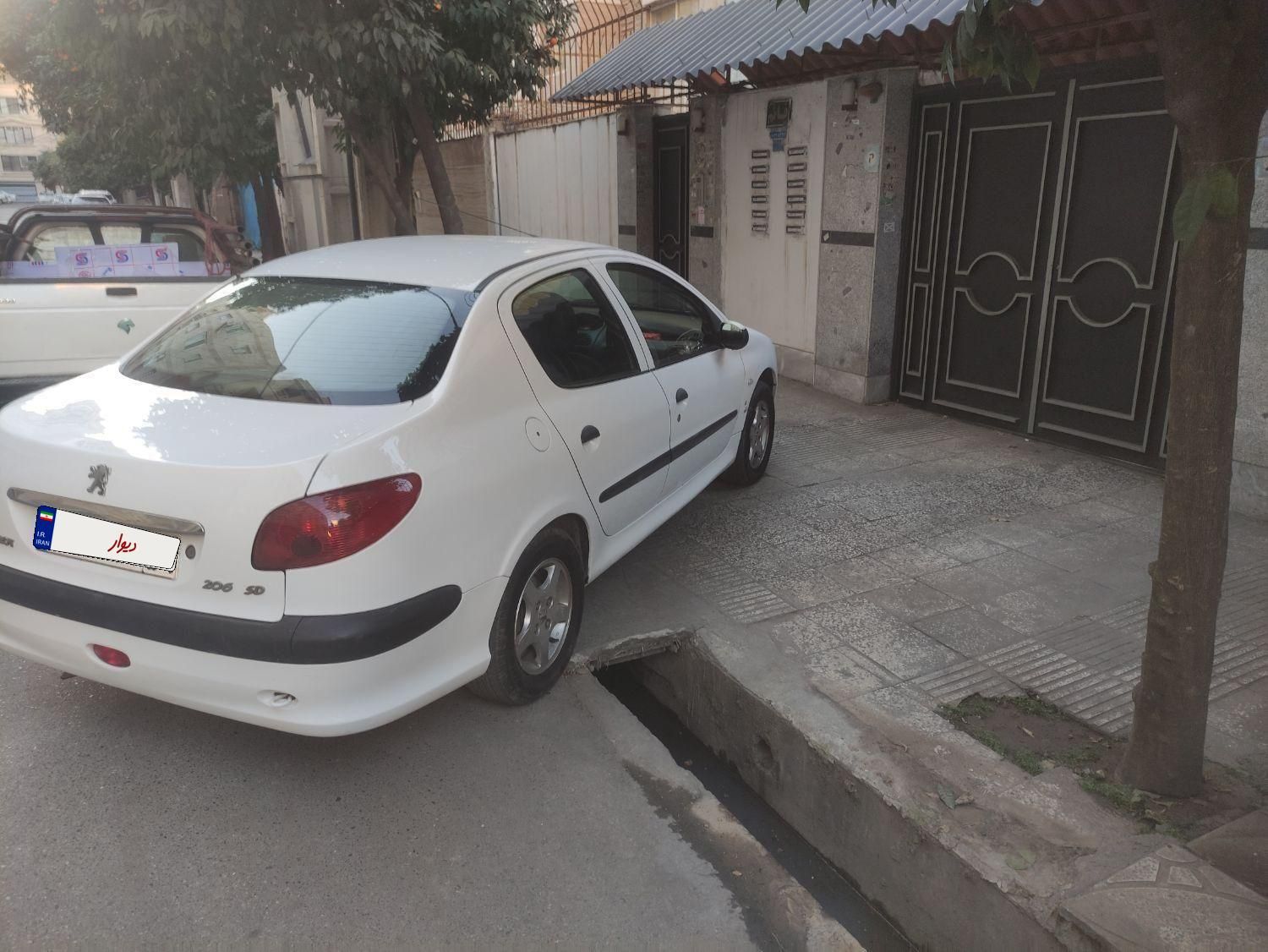 پژو ۲۰۶ صندوق دار v8 - 1390
