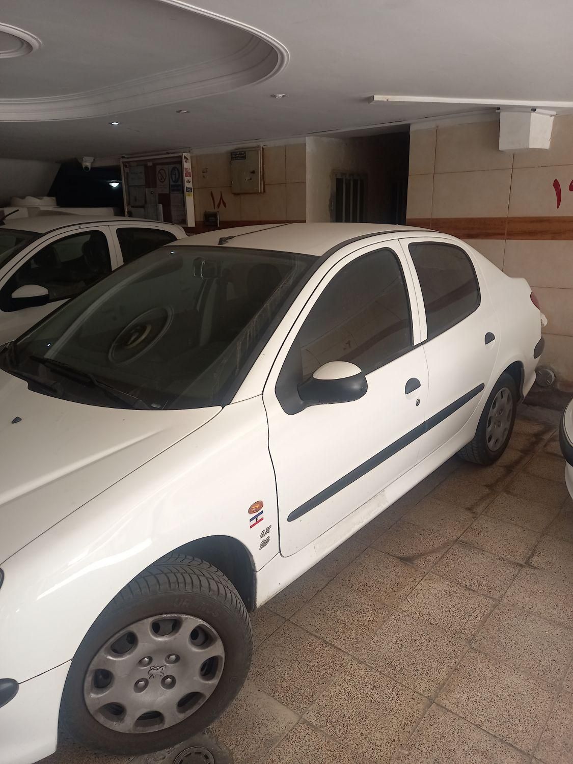 پژو ۲۰۶ صندوق دار v8 - 1399