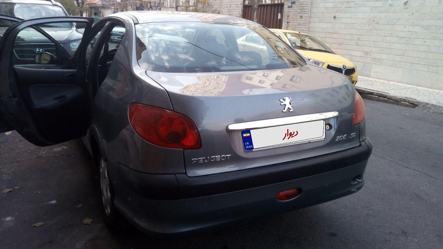 پژو ۲۰۶ صندوق دار v8 - 1394