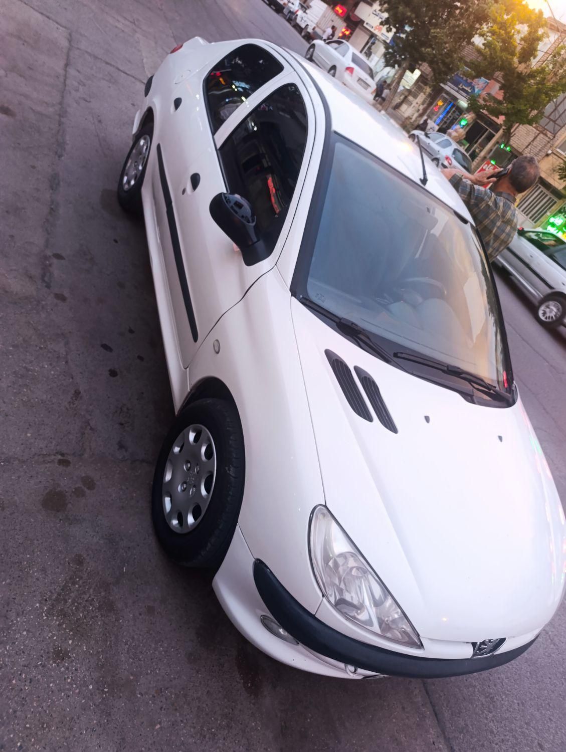 پژو ۲۰۶ صندوق دار v8 - 1394
