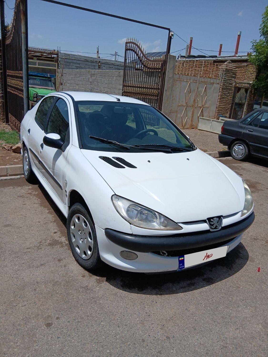 پژو ۲۰۶ صندوق دار v8 - 1390