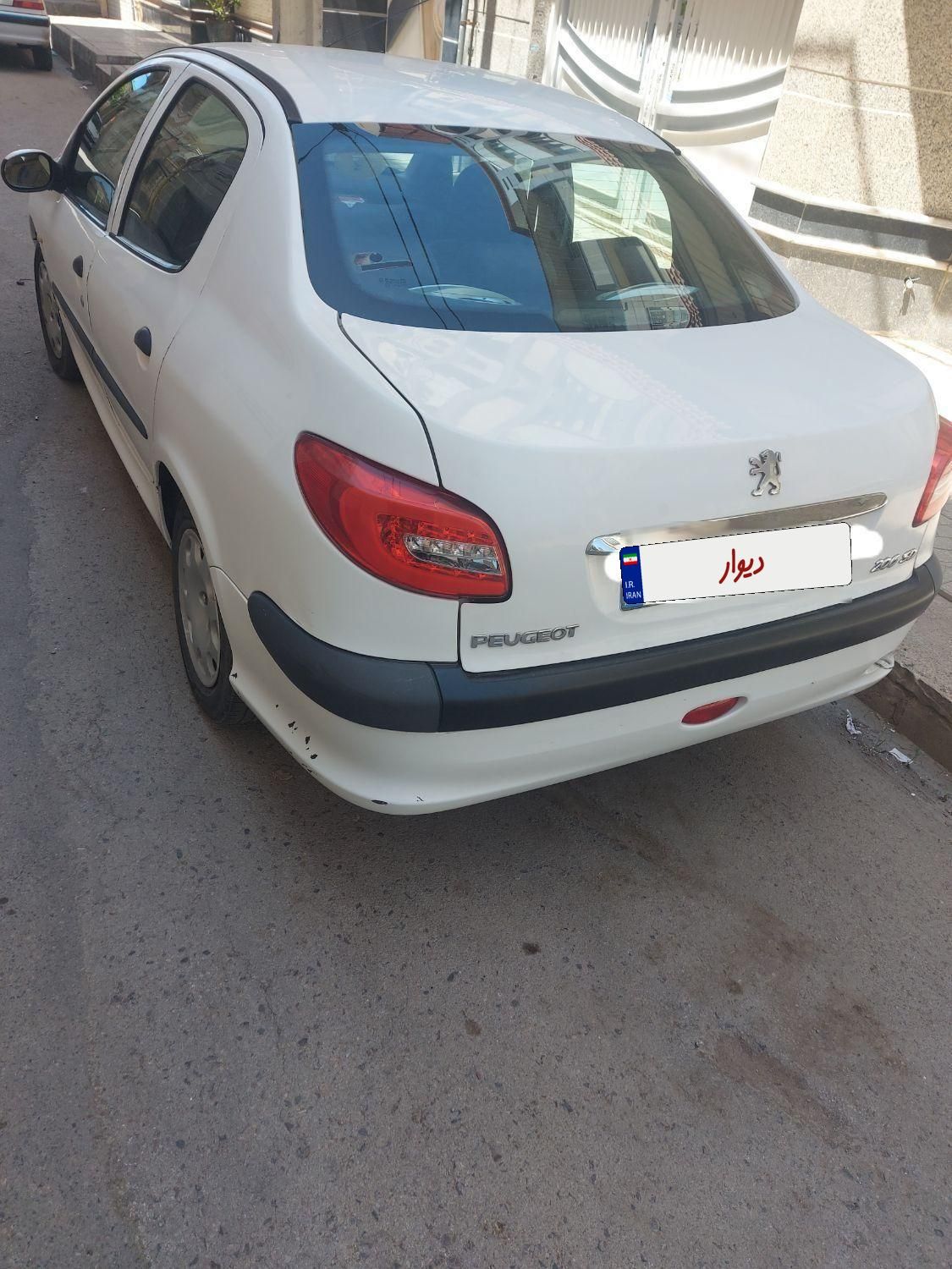 پژو ۲۰۶ صندوق دار v8 - 1392