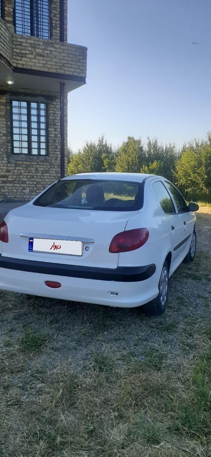 پژو ۲۰۶ صندوق دار v8 - 1396