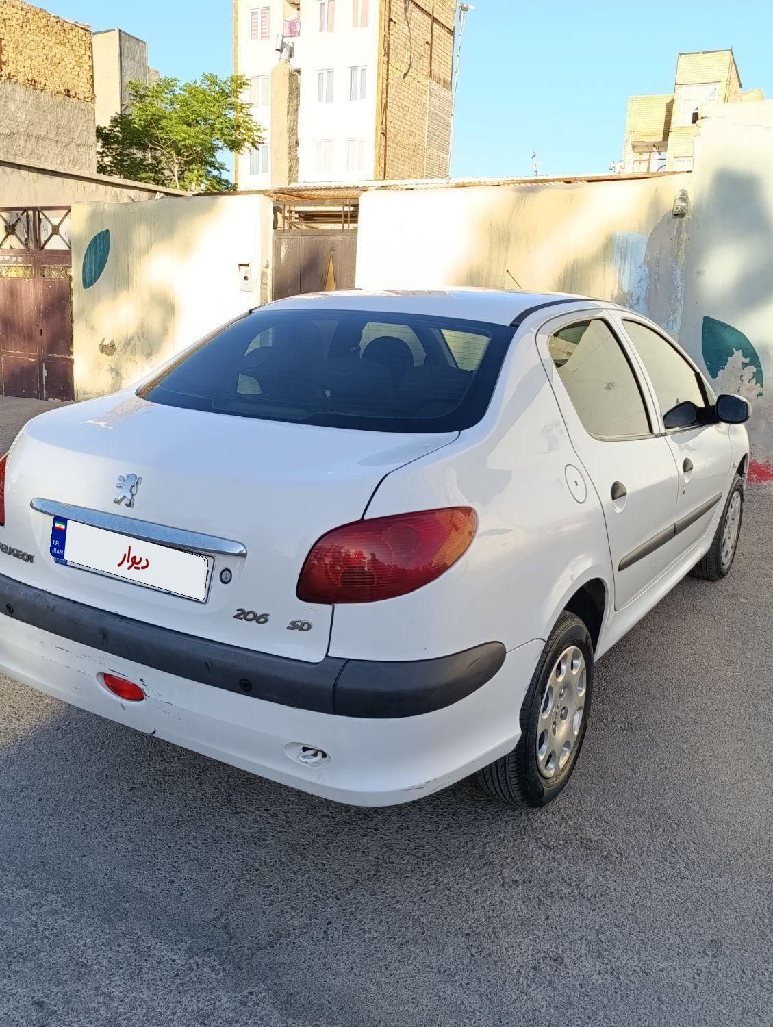 پژو ۲۰۶ صندوق دار v8 - 1394