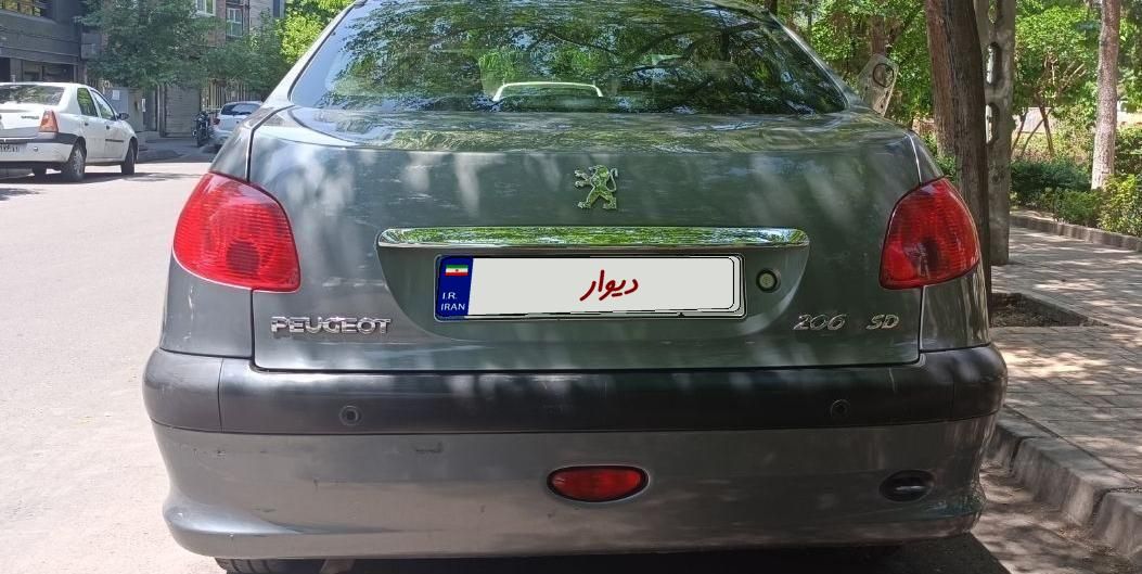 پژو ۲۰۶ صندوق دار v8 - 1397