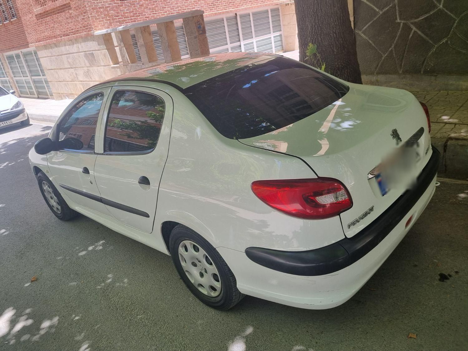 پژو ۲۰۶ صندوق دار v8 - 1395