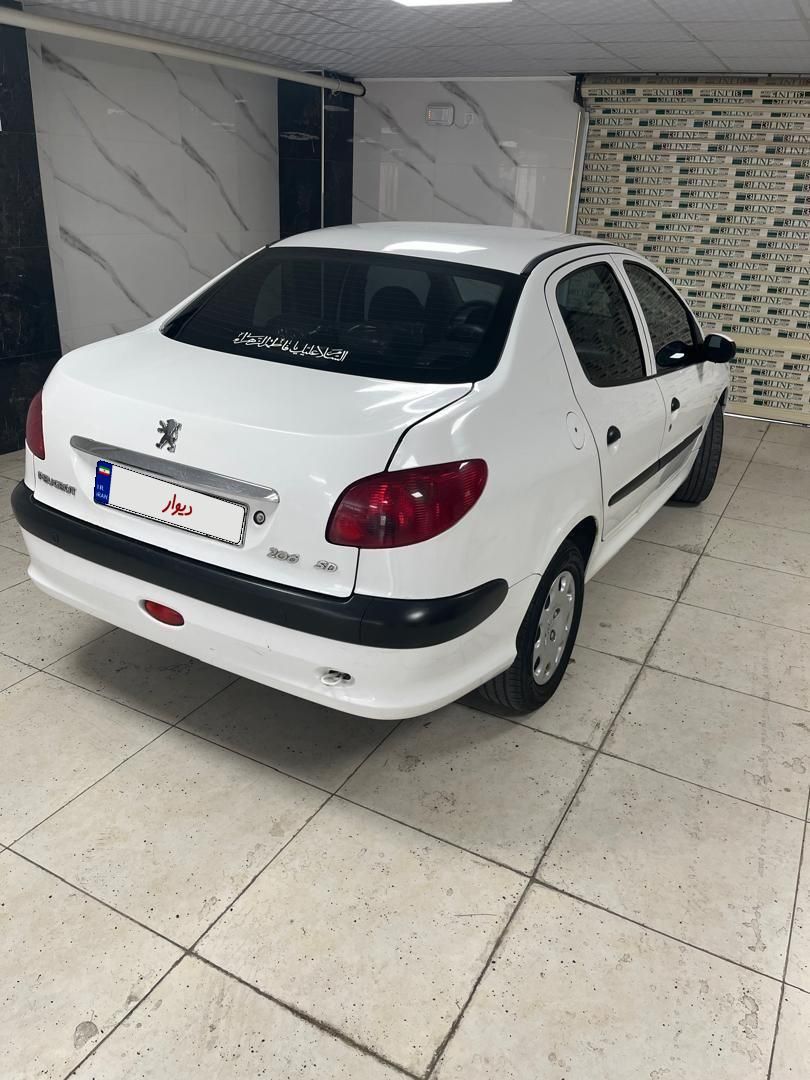 پژو ۲۰۶ صندوق دار v8 - 1394