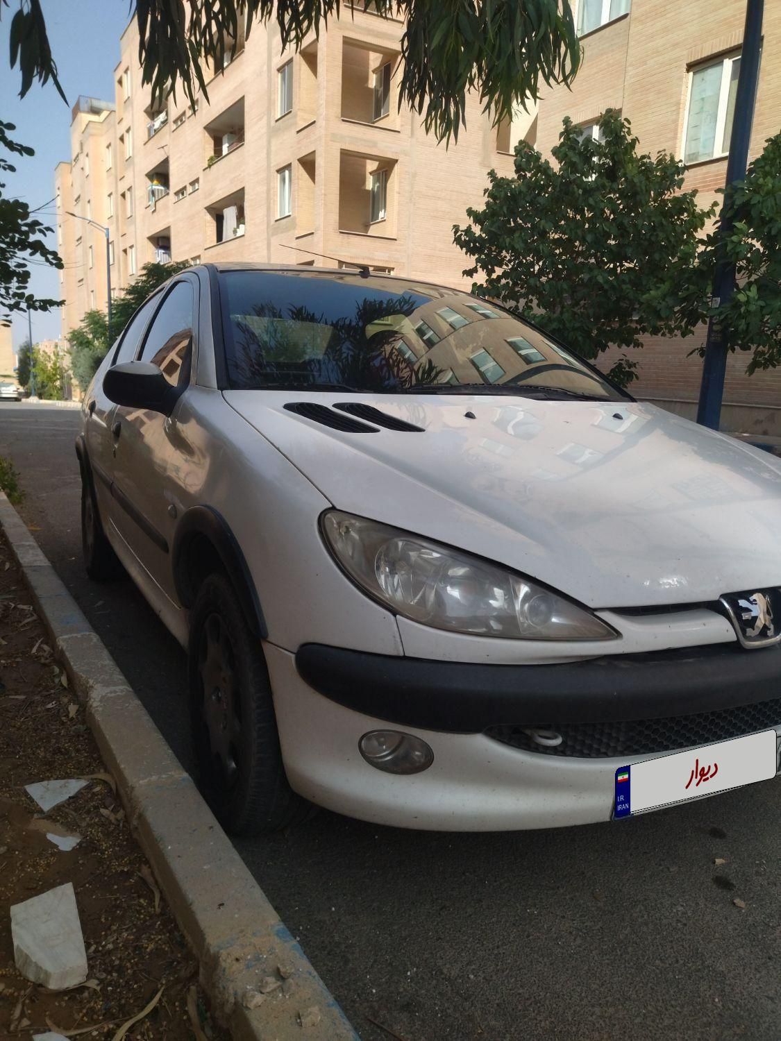 پژو ۲۰۶ صندوق دار v8 - 1391