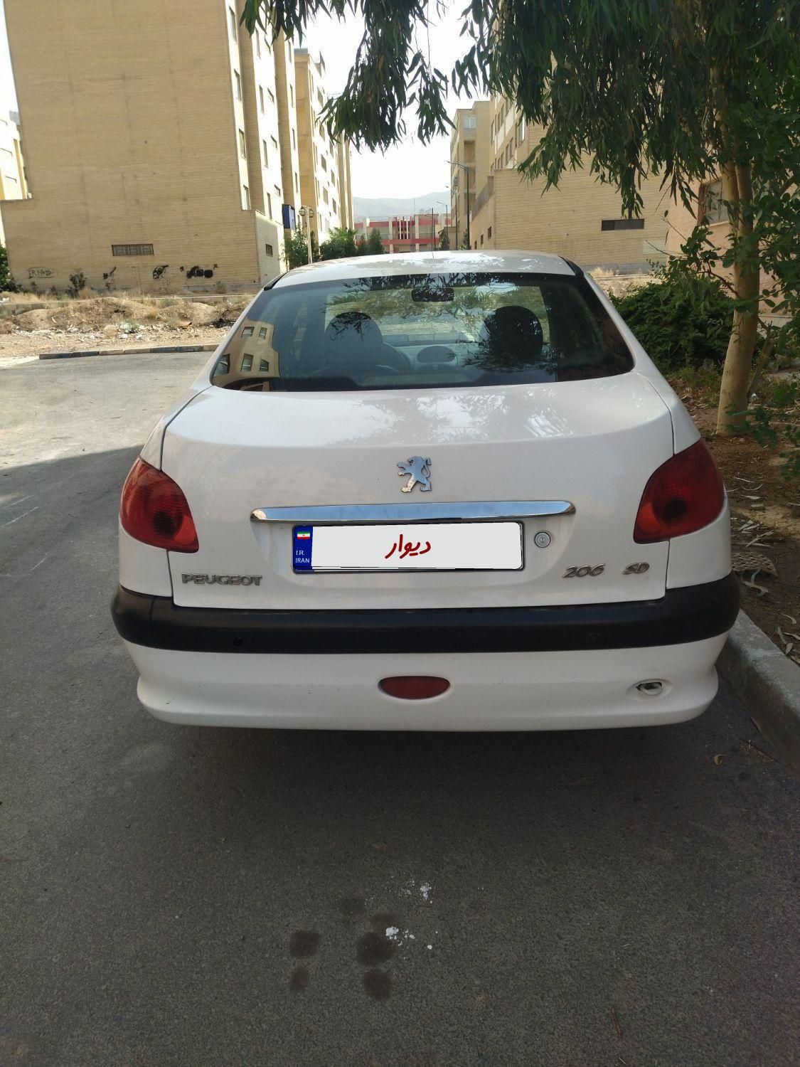 پژو ۲۰۶ صندوق دار v8 - 1391