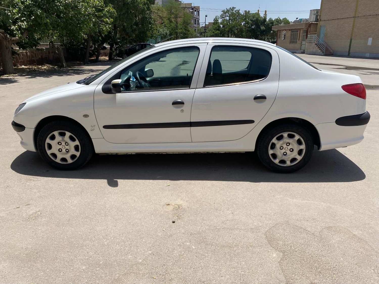 پژو ۲۰۶ صندوق دار v8 - 1394