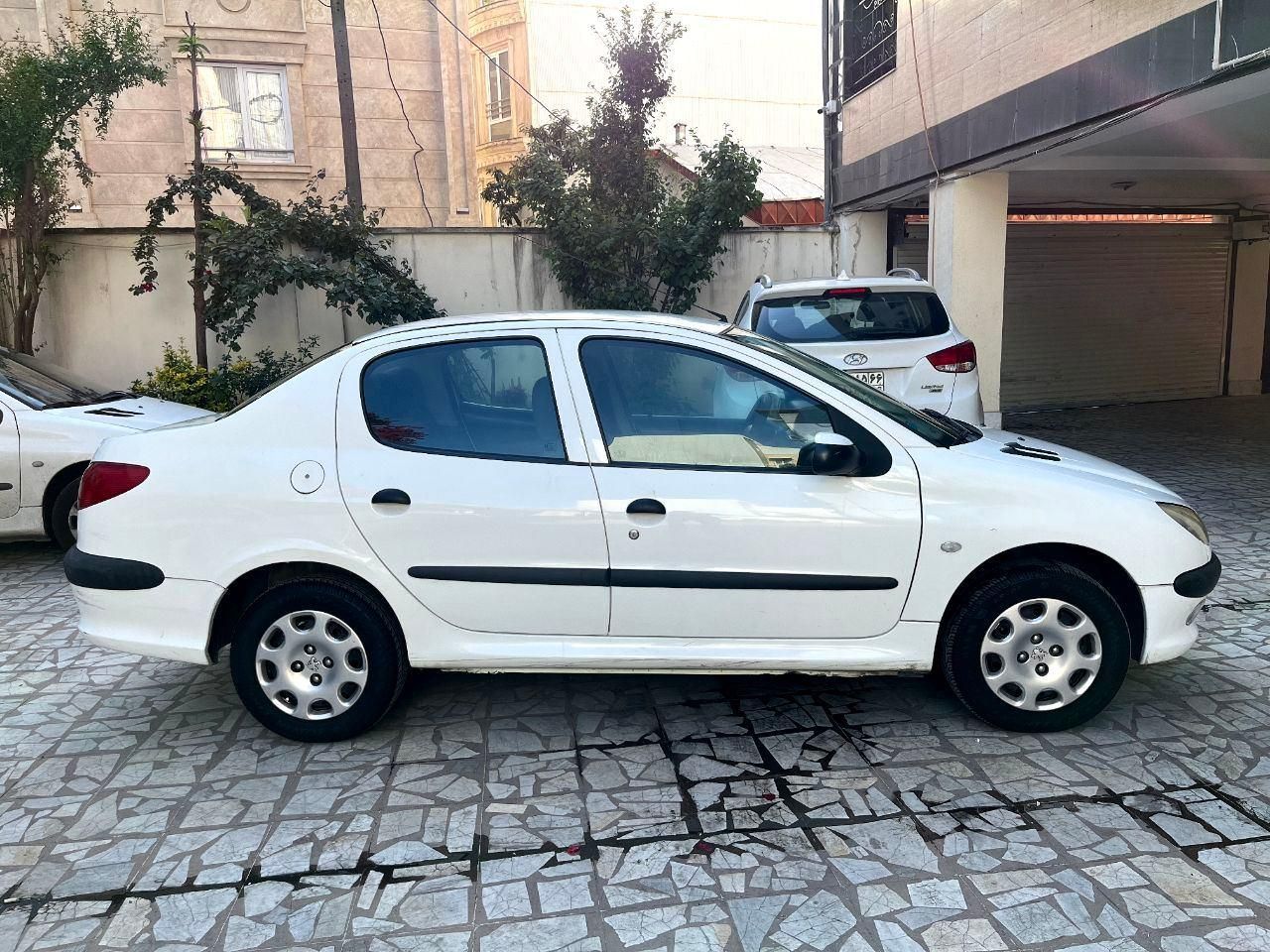 پژو ۲۰۶ صندوق دار v8 - 1395