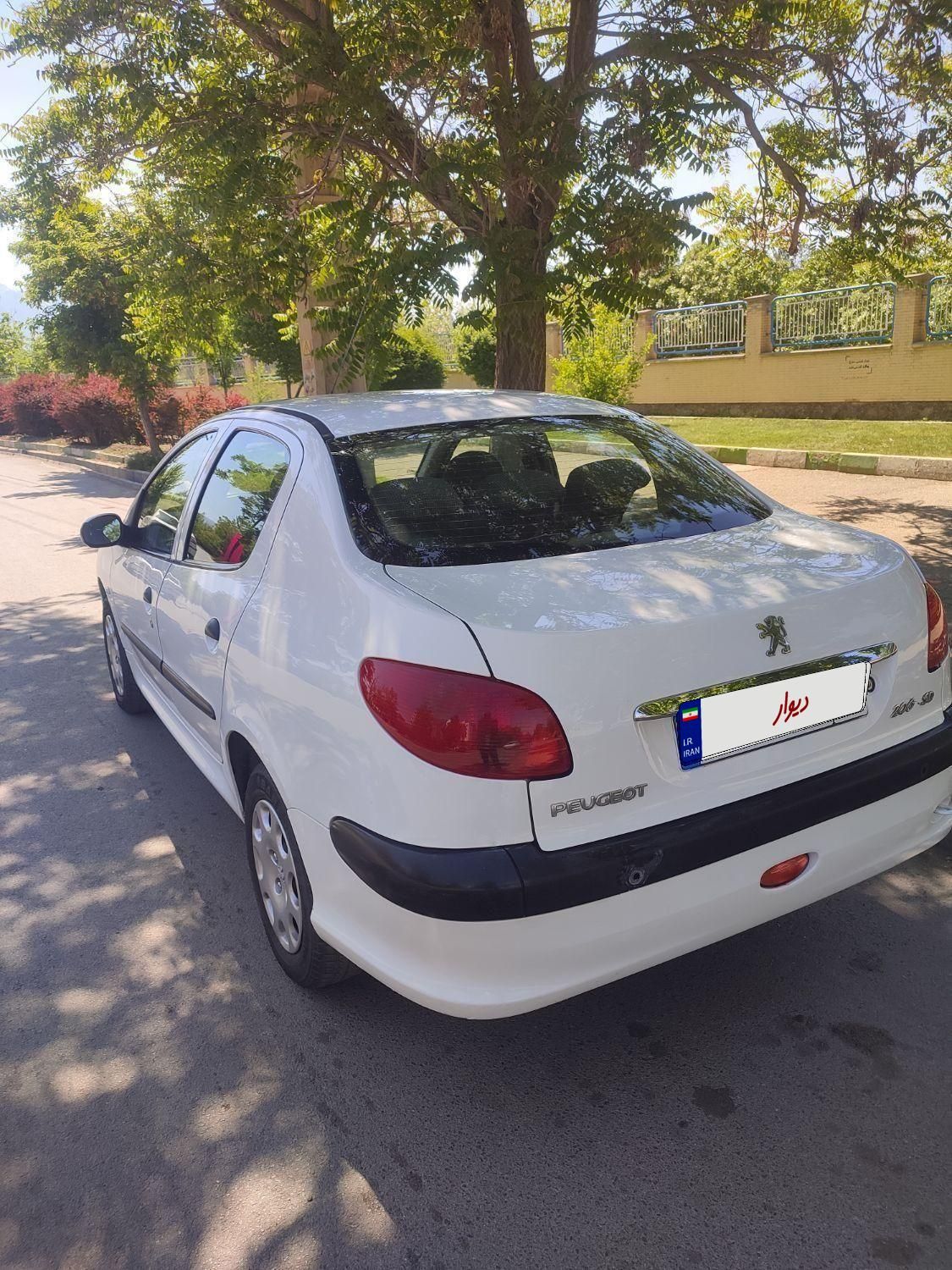 پژو ۲۰۶ صندوق دار v8 - 1396