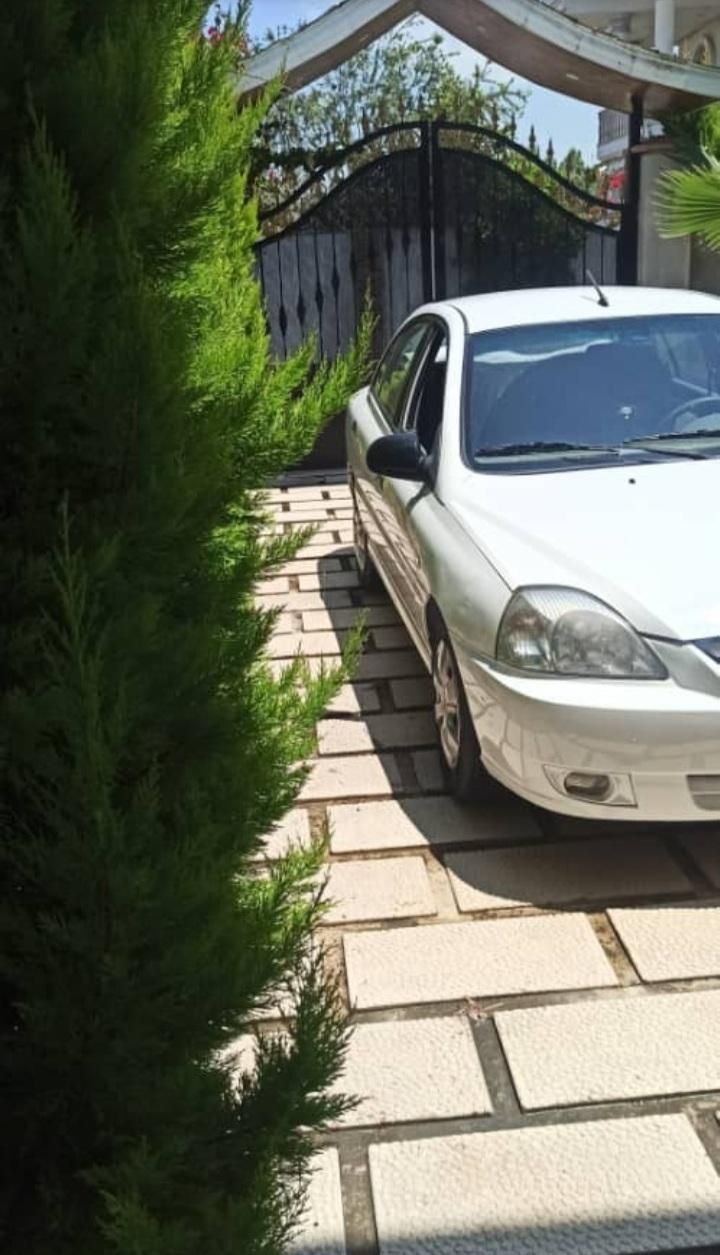 کیا ریو صندوقدار نیمه فول UB - 2009