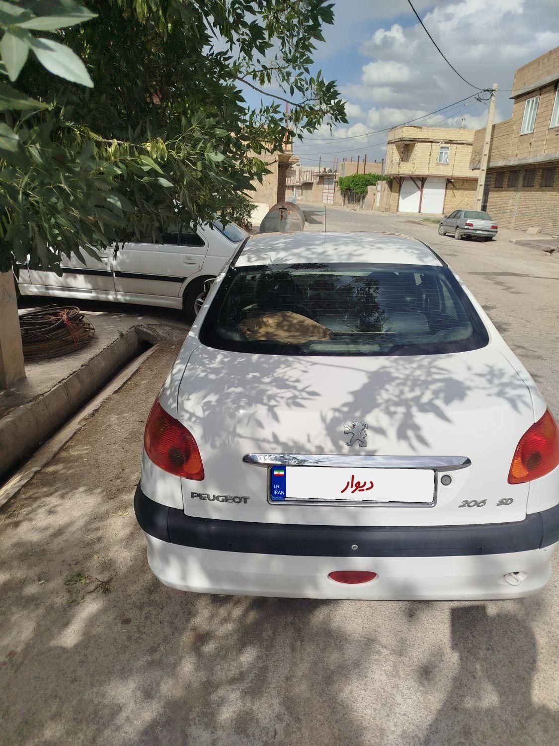 پژو ۲۰۶ صندوق دار v8 - 1394
