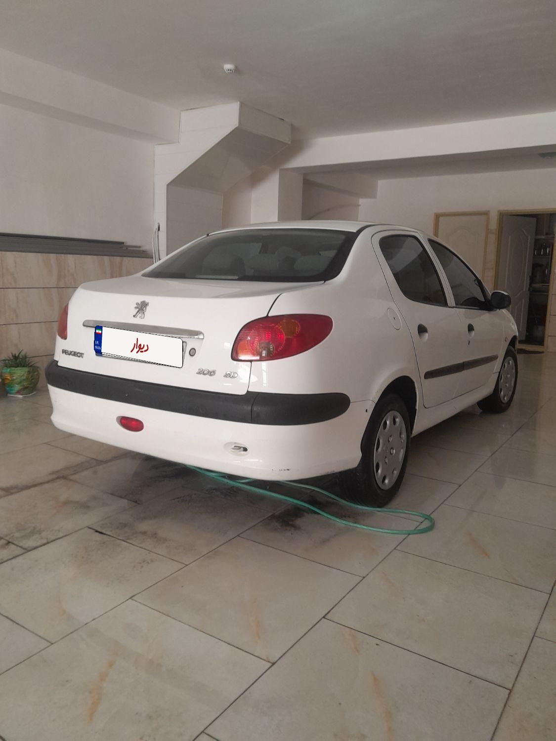 پژو ۲۰۶ صندوق دار v8 - 1394