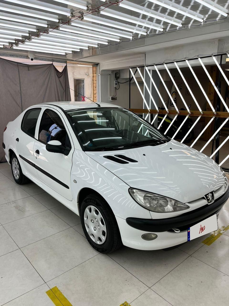 پژو ۲۰۶ صندوق دار v8 - 1396