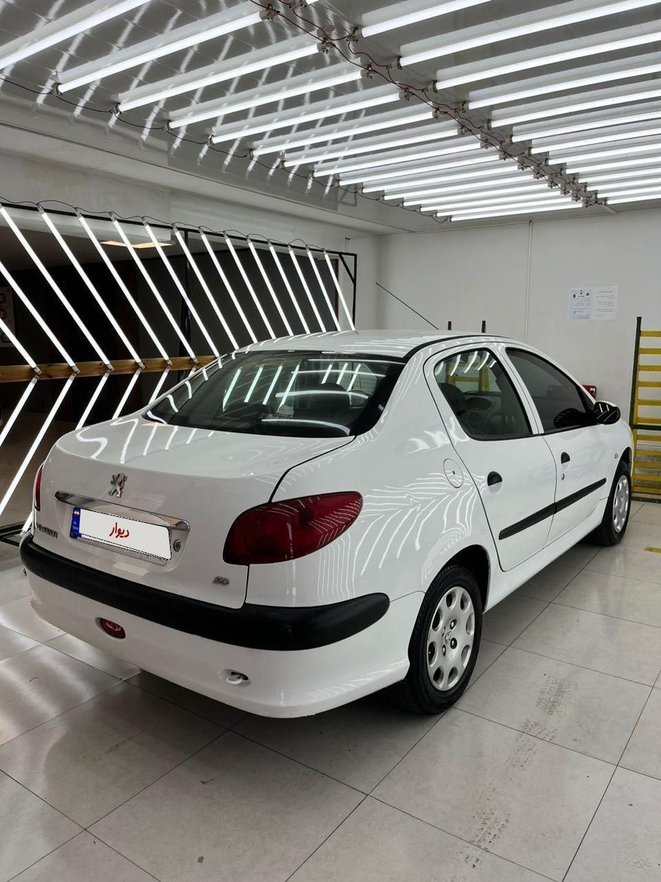 پژو ۲۰۶ صندوق دار v8 - 1396