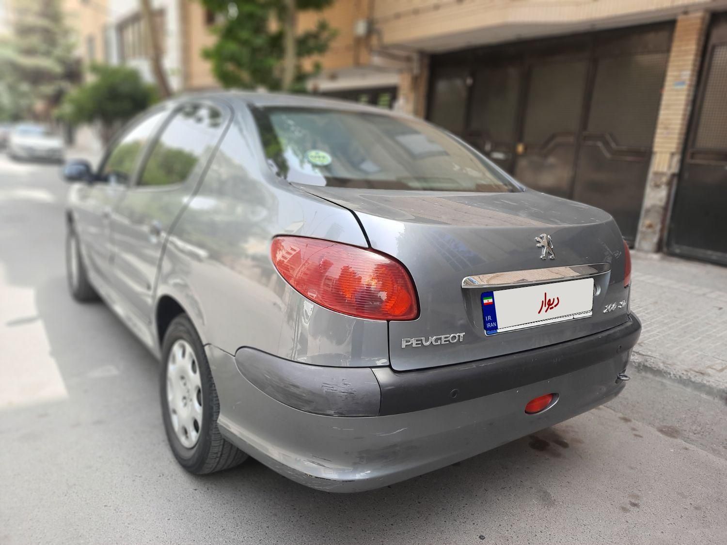 پژو ۲۰۶ صندوق دار v8 - 1397