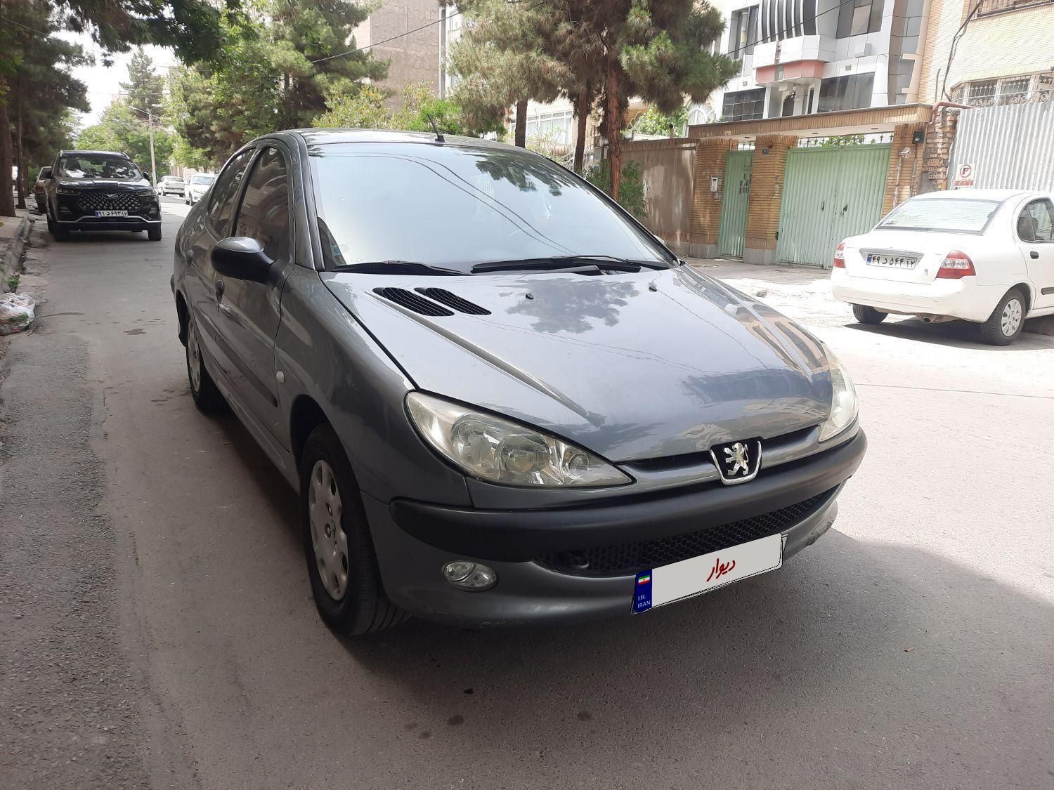 پژو ۲۰۶ صندوق دار v8 - 1397