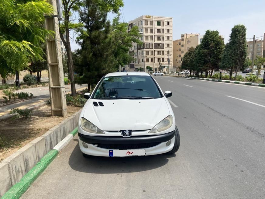 پژو ۲۰۶ صندوق دار v8 - 1390