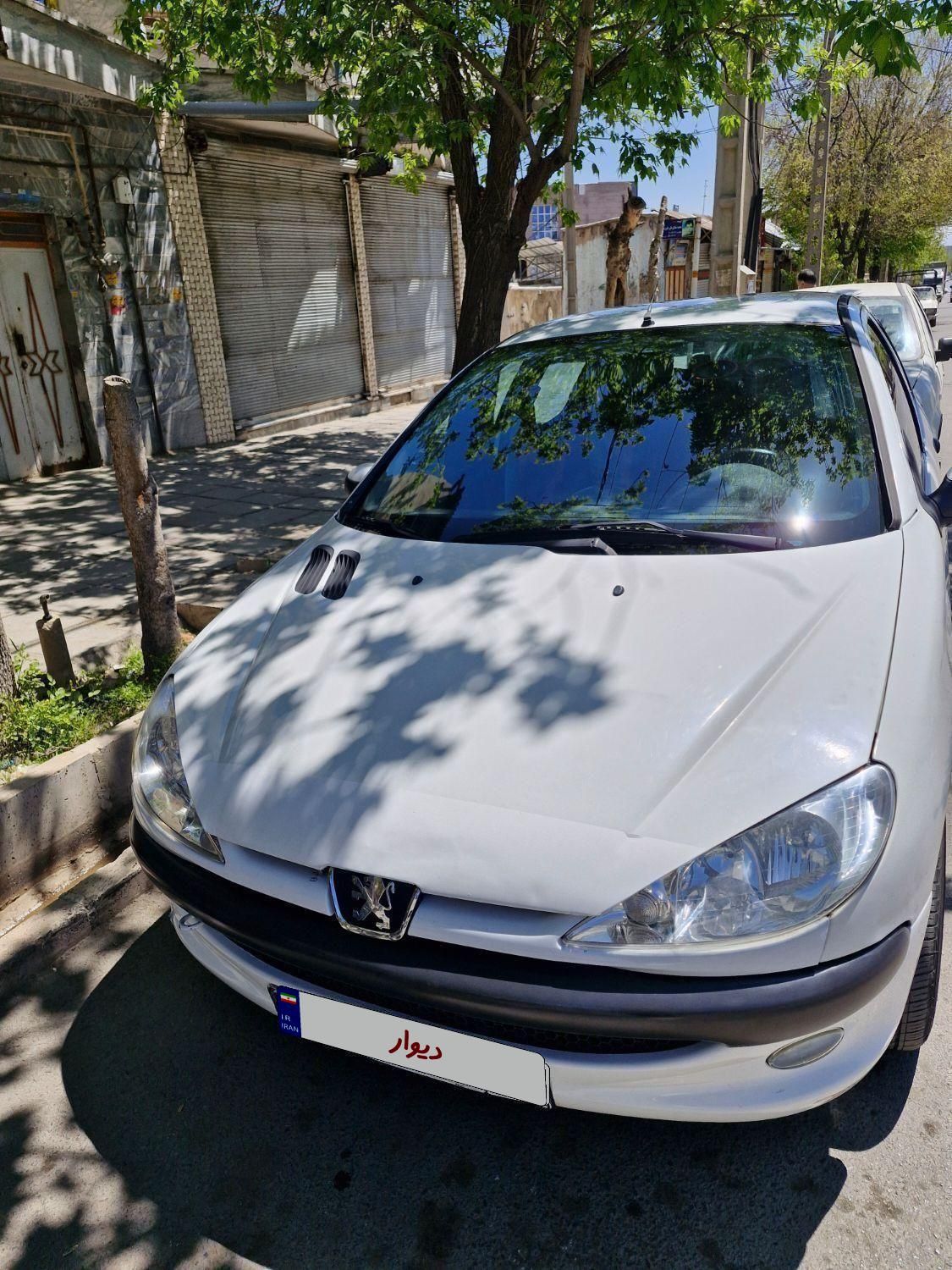 پژو ۲۰۶ صندوق دار v8 - 1394