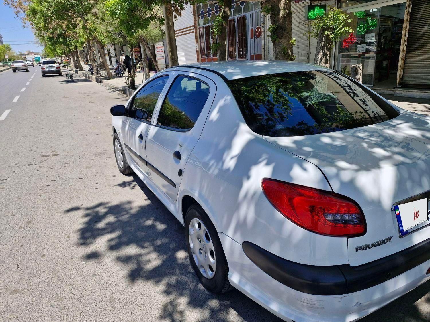 پژو ۲۰۶ صندوق دار v8 - 1394