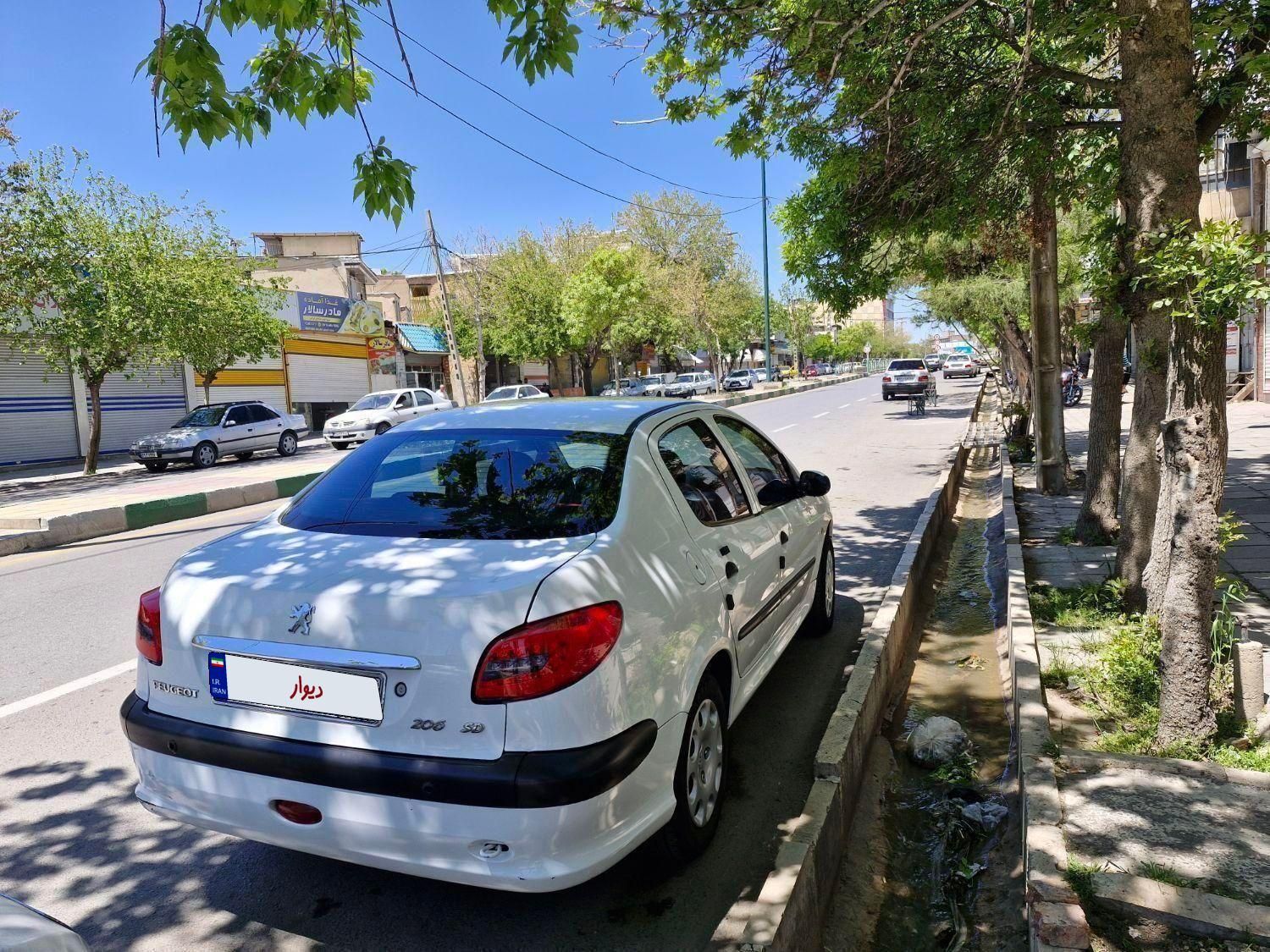 پژو ۲۰۶ صندوق دار v8 - 1394