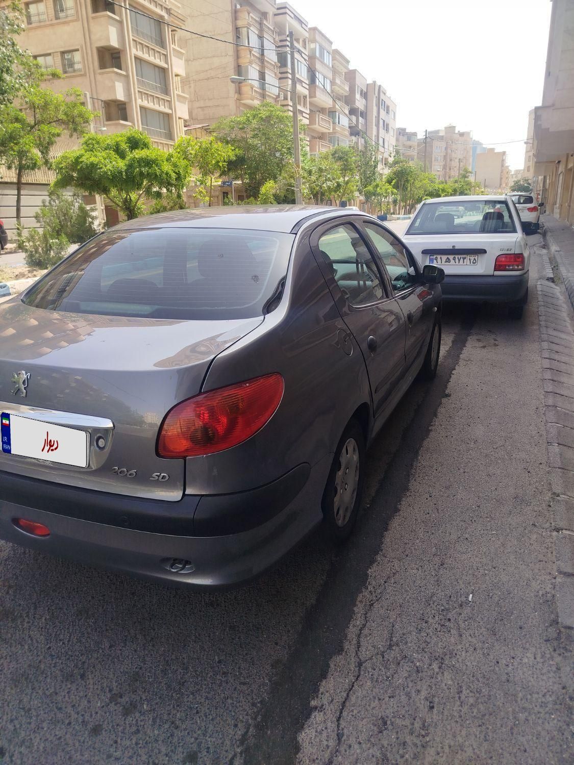 پژو ۲۰۶ صندوق دار v8 - 1394