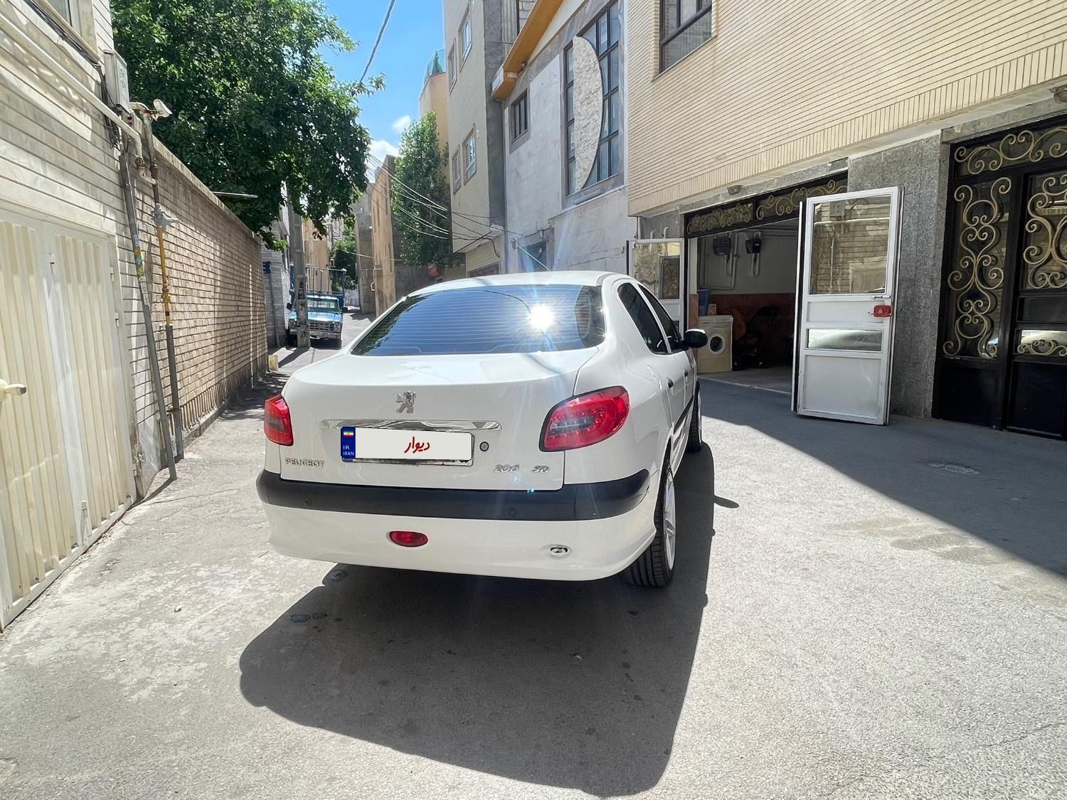 پژو ۲۰۶ صندوق دار v8 - 1394