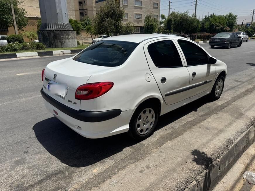 پژو ۲۰۶ صندوق دار v8 - 1390
