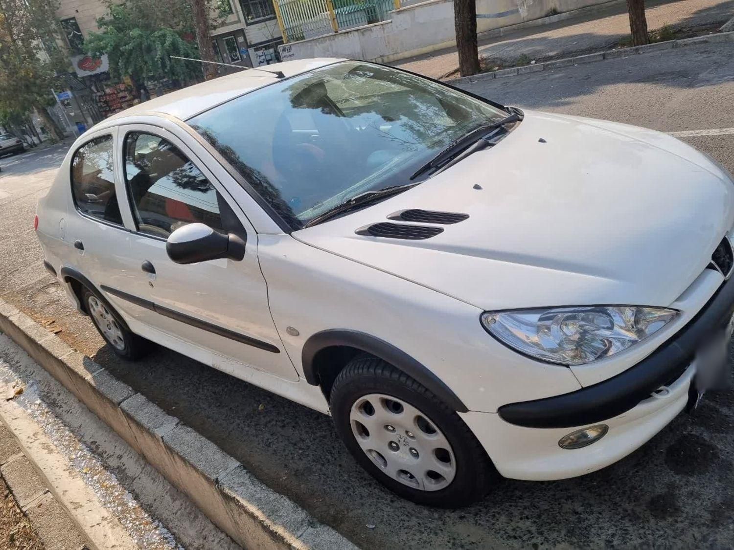 پژو ۲۰۶ صندوق دار v8 - 1399