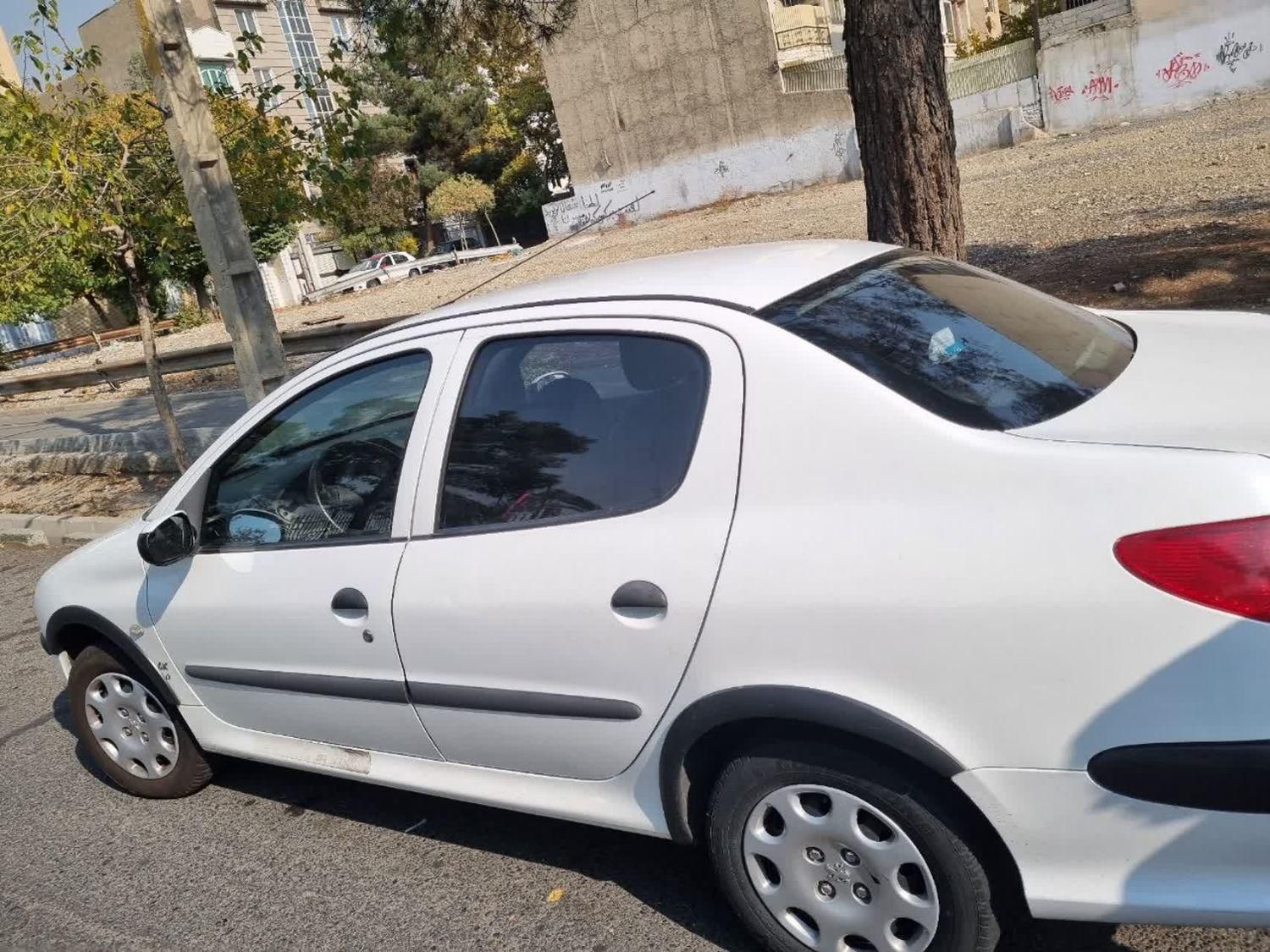 پژو ۲۰۶ صندوق دار v8 - 1399
