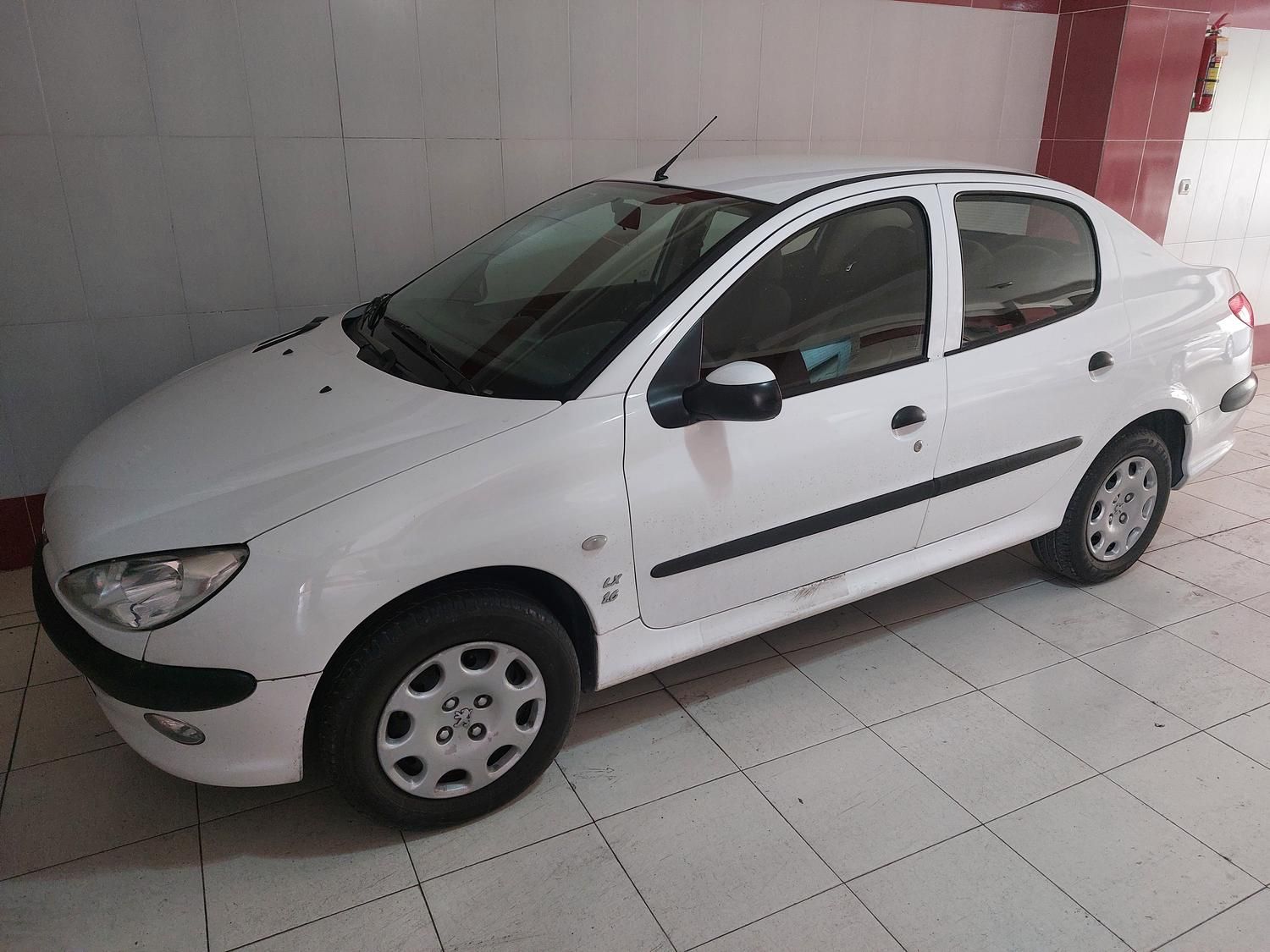 پژو ۲۰۶ صندوق دار v8 - 1399