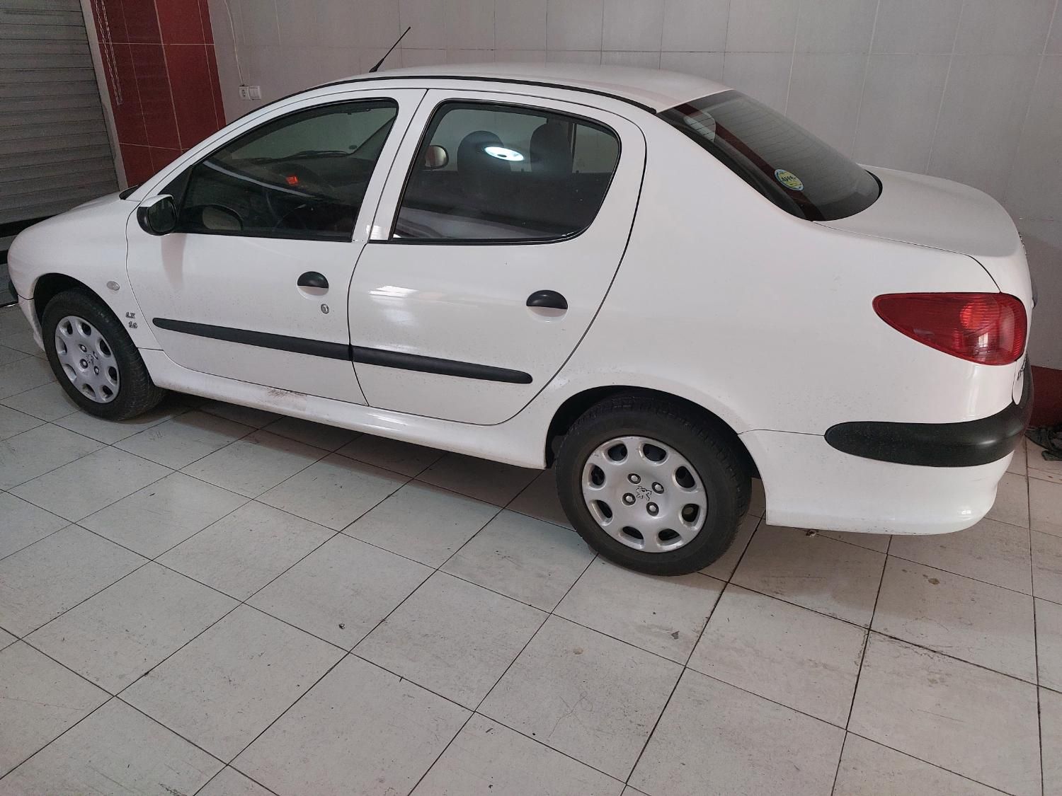 پژو ۲۰۶ صندوق دار v8 - 1399