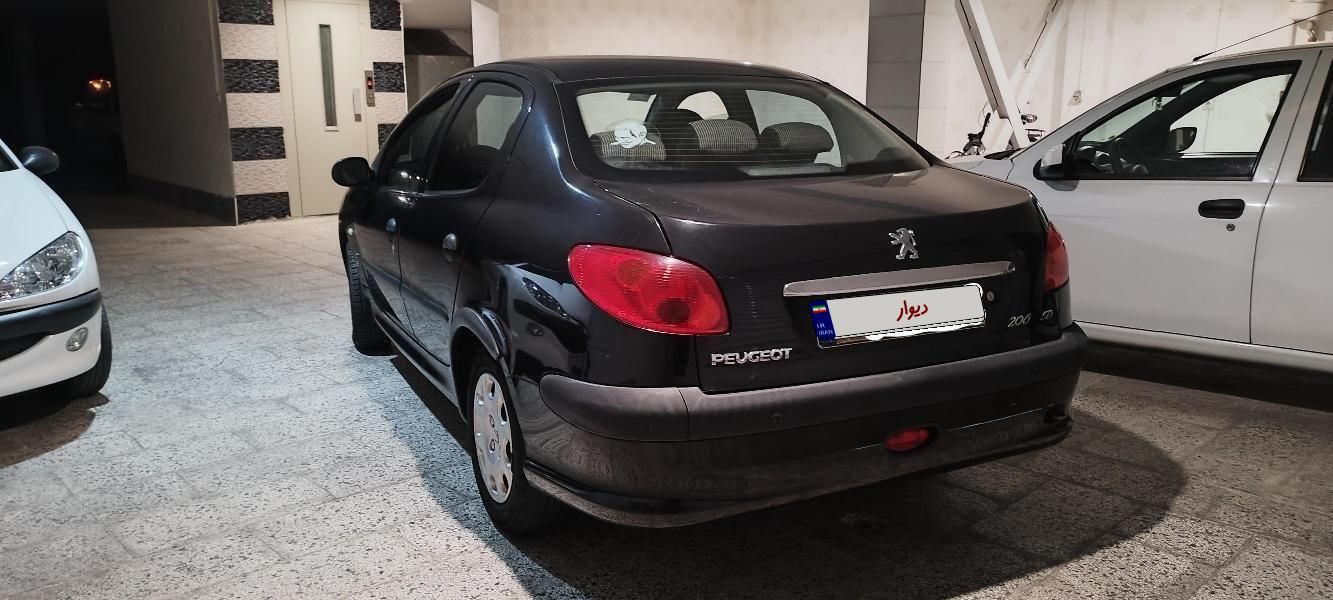 پژو ۲۰۶ صندوق دار v8 - 1393