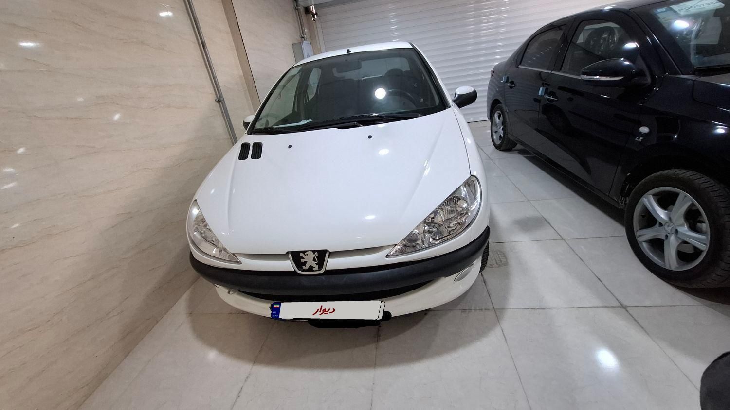 پژو ۲۰۶ صندوق دار v8 - 1396