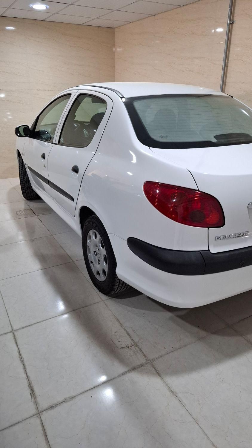 پژو ۲۰۶ صندوق دار v8 - 1396