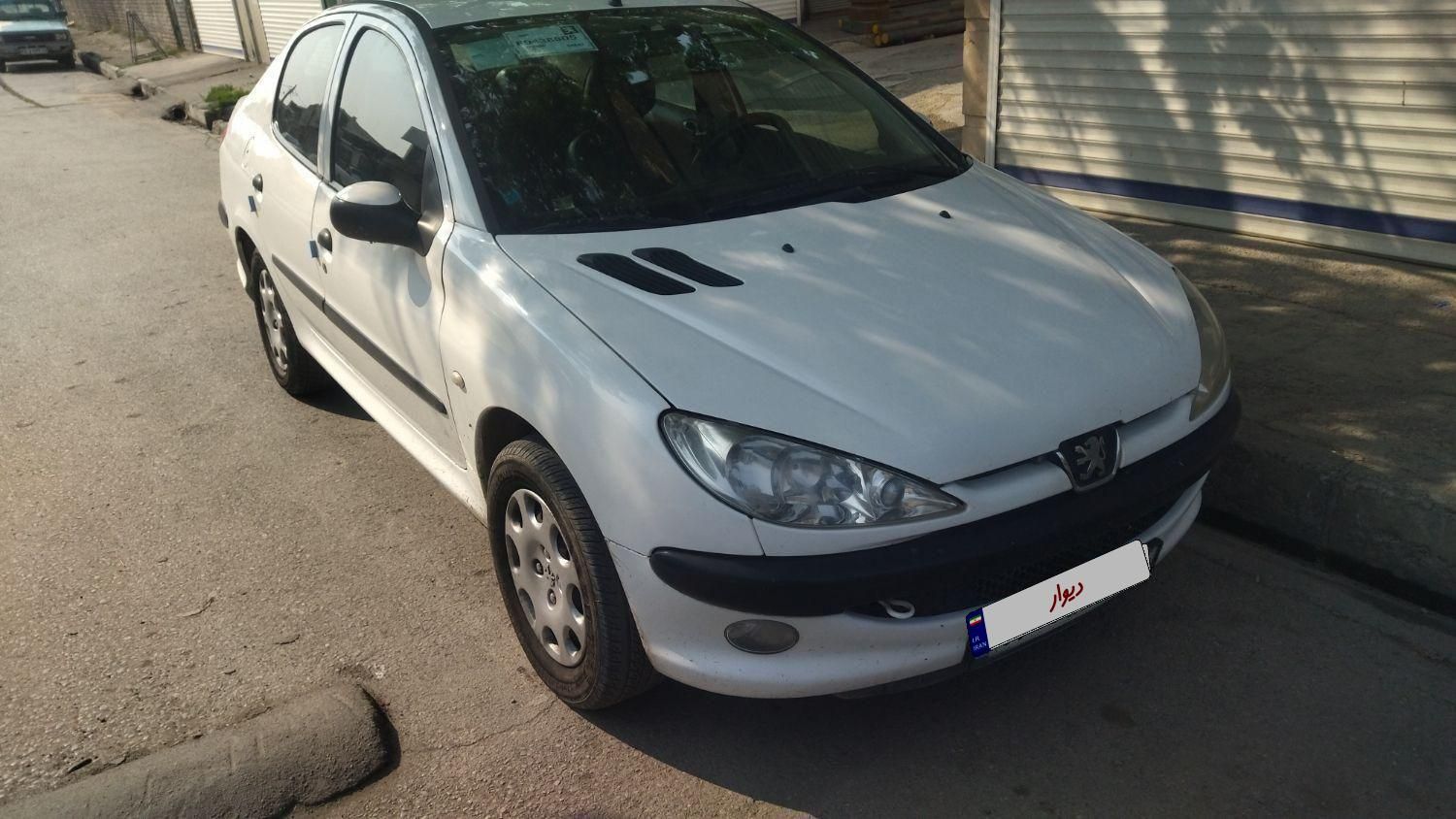 پژو ۲۰۶ صندوق دار v8 - 1395