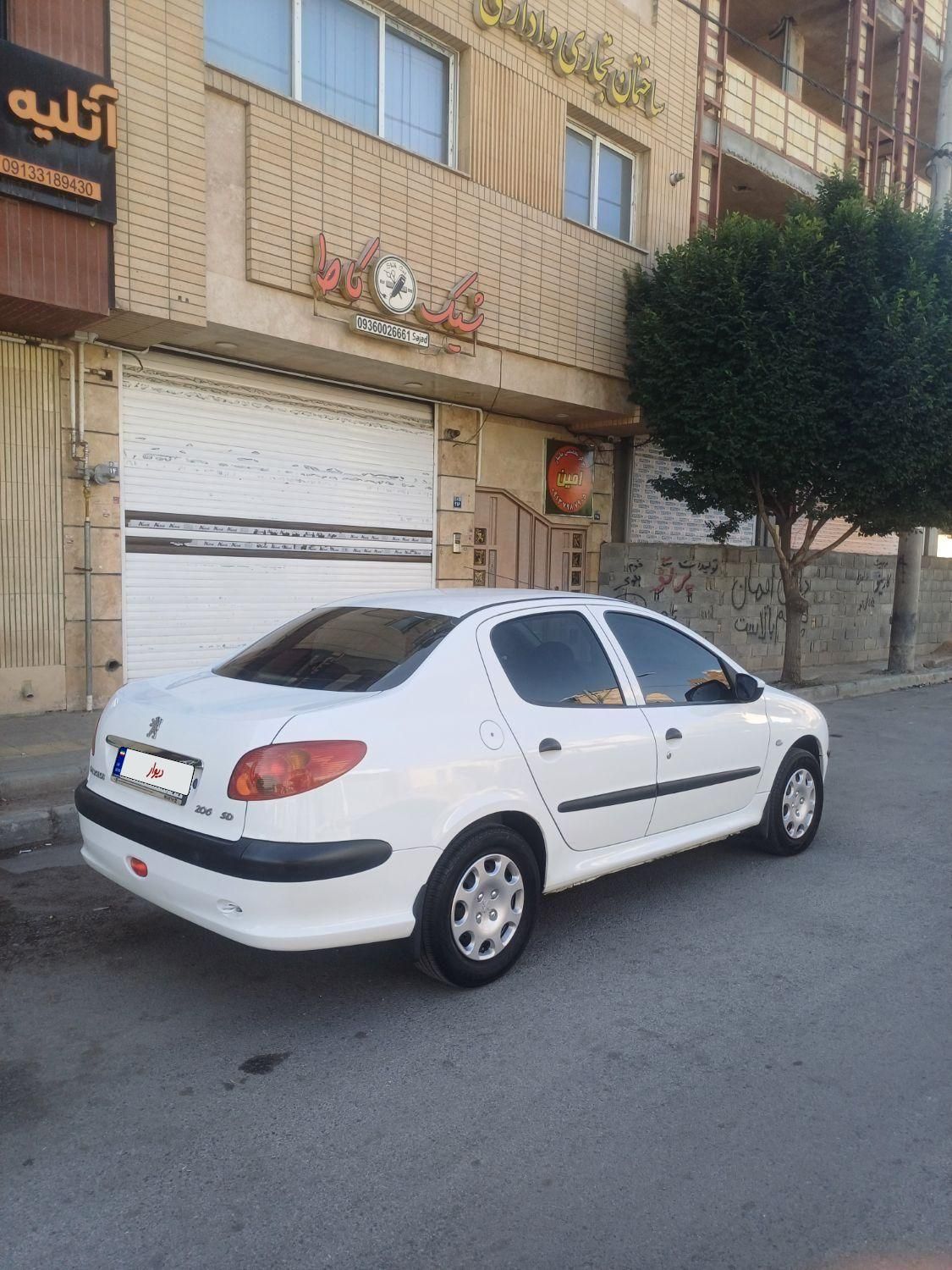 پژو ۲۰۶ صندوق دار v8 - 1393